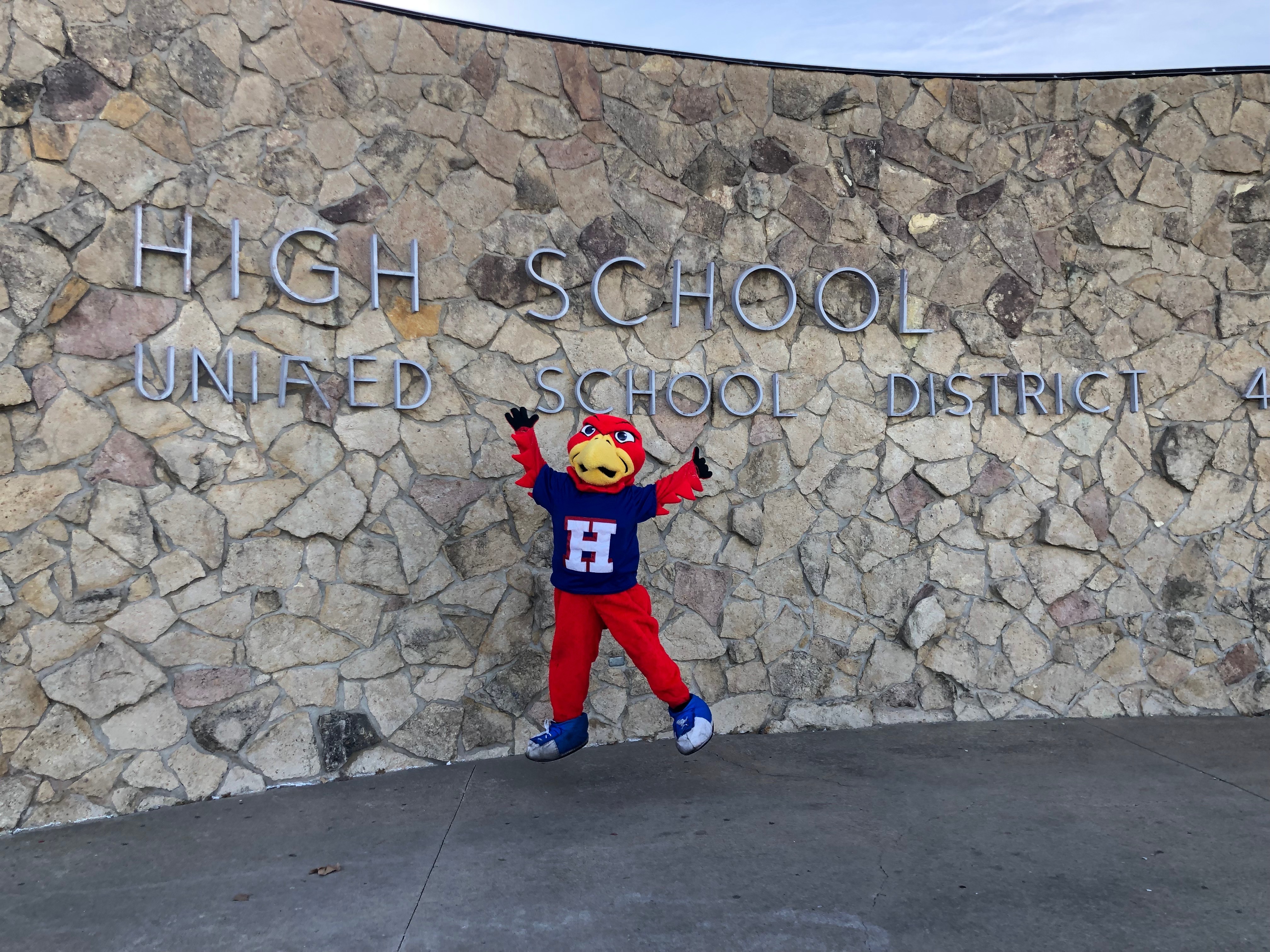 Red Hawk in front of HHS